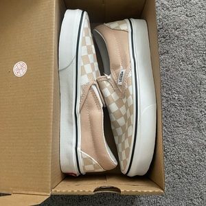 Vans checkered slip ons